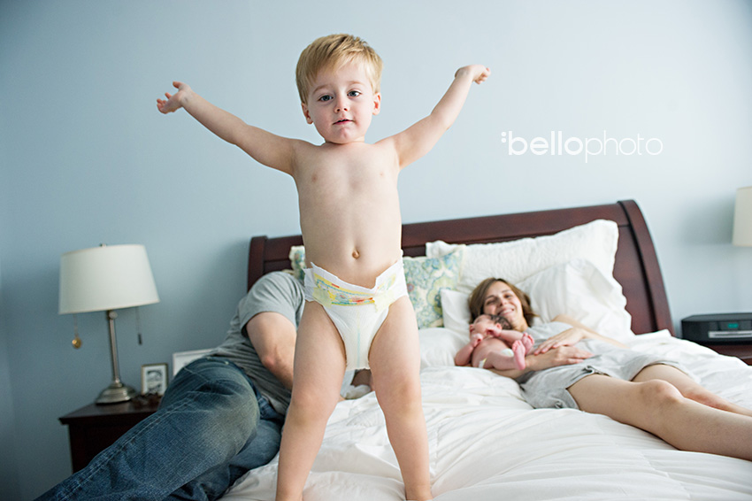 jumping in bed, family lifestyle photographer