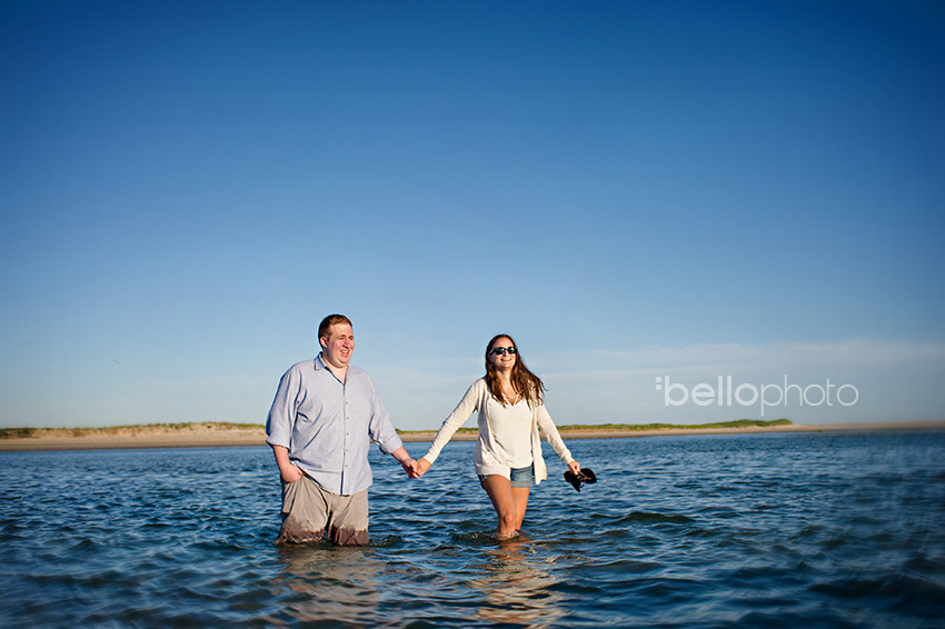 walking in ocean at sunset