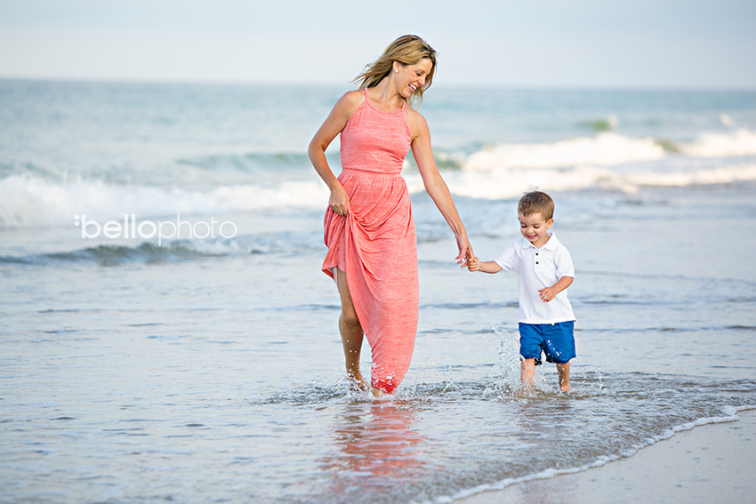 mom & son walking on beach