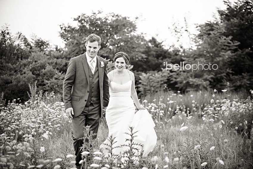 bride & groom in a field of flowers
