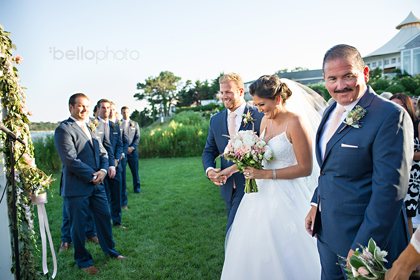 father hands off bride