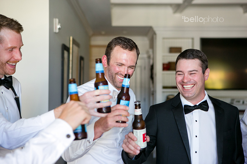 groom and groomsmen toasting before wequassett wedding