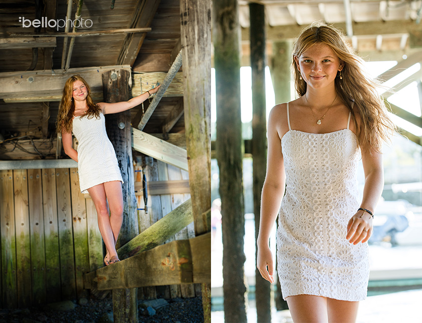 beautiful girl walking along beach pilings