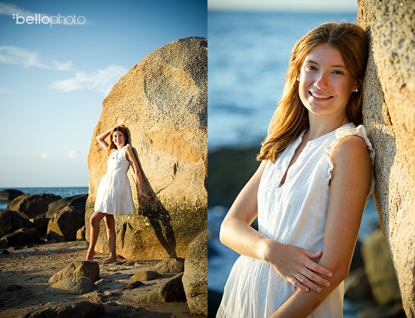 pretty high school senior girl by large beach bolder