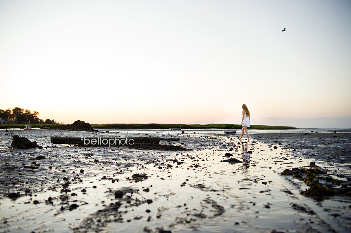 beautiful girl walking in muddy flats at sunset, beautiful girl at sunset standing in beach grass, beautiful girl playing at beach, Cape Cod senior portrait