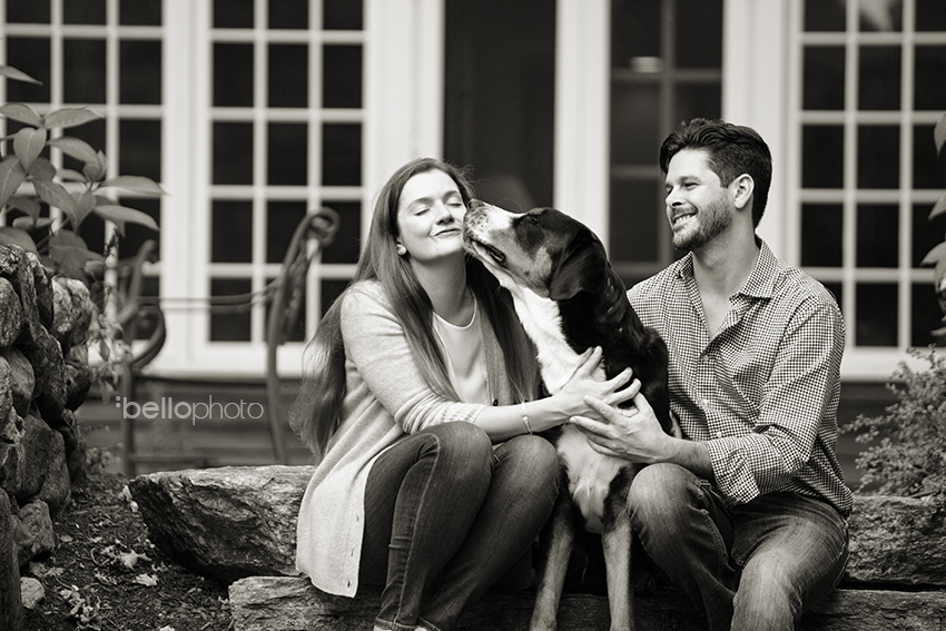 engagement session with dog kissing